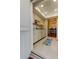 Bright kitchen with white cabinets and granite countertops at 1221 Drew St # E11, Clearwater, FL 33755