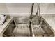 Modern double stainless steel sink with a high-end faucet at 1221 Drew St # E11, Clearwater, FL 33755