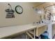 Shared laundry room with folding tables and sinks at 1221 Drew St # E11, Clearwater, FL 33755