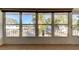 Sunroom with large windows and window shades offering an outdoor view at 1221 Drew St # E11, Clearwater, FL 33755
