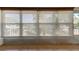 Sunroom with large windows and window shades offering an outdoor view at 1221 Drew St # E11, Clearwater, FL 33755