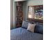 Bedroom with built-in shelves and Star Wars poster at 1707 New Bedford Dr, Sun City Center, FL 33573