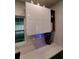 Modern kitchen with white upper cabinets and dark lower cabinets at 1707 New Bedford Dr, Sun City Center, FL 33573