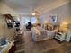 Main bedroom with king-size bed, and built-in workspace at 1707 New Bedford Dr, Sun City Center, FL 33573