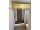 Accessible walk-in shower with stylish tile work at 1707 New Bedford Dr, Sun City Center, FL 33573