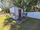 Charming backyard shed with a deck, perfect for extra storage at 1707 New Bedford Dr, Sun City Center, FL 33573