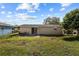 Large backyard with grassy area and patio at 2903 W Walnut St, Tampa, FL 33607