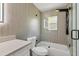 Modern bathroom with a glass shower and updated fixtures at 4290 Yucatan Cir, Port Charlotte, FL 33948