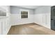 Bright bedroom with wainscoting and a window with blinds at 4290 Yucatan Cir, Port Charlotte, FL 33948