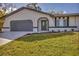 Updated home exterior with a modern look at 4290 Yucatan Cir, Port Charlotte, FL 33948