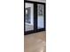 Elegant French doors open to a sunroom or patio area at 4290 Yucatan Cir, Port Charlotte, FL 33948