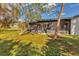 Spacious screened porch, perfect for relaxing outdoors at 4290 Yucatan Cir, Port Charlotte, FL 33948