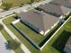 Aerial view of a house and its fenced backyard at 12512 Brick Cobblestone Dr, Riverview, FL 33579