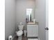 Small bathroom with toilet and sink at 12512 Brick Cobblestone Dr, Riverview, FL 33579