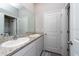 Bathroom with double vanity and granite countertop at 12512 Brick Cobblestone Dr, Riverview, FL 33579