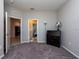 Spacious bedroom with carpeted floor and large window at 12512 Brick Cobblestone Dr, Riverview, FL 33579