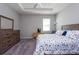 Spacious bedroom with a king-size bed and ample closet space at 12512 Brick Cobblestone Dr, Riverview, FL 33579