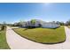 House exterior with a side yard, landscaping and walkway at 12512 Brick Cobblestone Dr, Riverview, FL 33579
