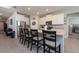 Modern kitchen with stainless steel appliances and an island at 12512 Brick Cobblestone Dr, Riverview, FL 33579