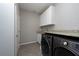 Laundry room with LG washer and dryer at 12512 Brick Cobblestone Dr, Riverview, FL 33579
