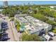 Aerial view of the property, highlighting its pool and parking at 1301 S Howard Ave # C23, Tampa, FL 33606