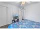 Bedroom with double bed, TV, and double door closet at 1503 Donegan Rd, Largo, FL 33771