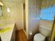 Clean bathroom with shower, toilet and sink at 2331 Belleair Rd # 611, Clearwater, FL 33764