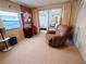 Bright bedroom with a desk and relaxing armchair at 2331 Belleair Rd # 611, Clearwater, FL 33764