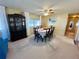 Dining room with a large wooden hutch and six chairs at 2331 Belleair Rd # 611, Clearwater, FL 33764