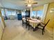 Bright dining room featuring a spacious table and chairs, perfect for Gathering meals at 2331 Belleair Rd # 611, Clearwater, FL 33764