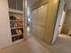 Home hallway with built-in shelving and ample storage space at 2331 Belleair Rd # 611, Clearwater, FL 33764