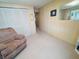 Spacious living room with large windows and comfortable seating at 2331 Belleair Rd # 611, Clearwater, FL 33764