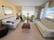 Cozy living room with ample seating and a coffee table, creating a relaxing atmosphere at 2331 Belleair Rd # 611, Clearwater, FL 33764
