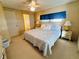 Spacious main bedroom with a king-size bed and ensuite bathroom at 2331 Belleair Rd # 611, Clearwater, FL 33764