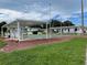 Outdoor shuffleboard courts with covered seating areas, perfect for community recreation and leisure at 2331 Belleair Rd # 611, Clearwater, FL 33764