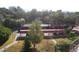 Aerial view showing parking, landscaping, and bay at 2699 Seville Blvd # 605, Clearwater, FL 33764