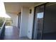 Private balcony with tile flooring and metal railing at 2699 Seville Blvd # 605, Clearwater, FL 33764