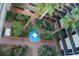 Lush courtyard with fountain and tropical plants at 2699 Seville Blvd # 605, Clearwater, FL 33764