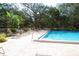Refreshing pool with ample lounge chairs for sunbathing at 2699 Seville Blvd # 605, Clearwater, FL 33764