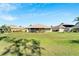 Home overlooks a beautiful green space at 334 Caloosa Palms Ct, Sun City Center, FL 33573