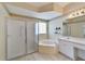 Bathroom with corner soaking tub, shower, and updated vanity at 334 Caloosa Palms Ct, Sun City Center, FL 33573