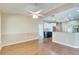Dining room with hardwood floors and kitchen access at 334 Caloosa Palms Ct, Sun City Center, FL 33573