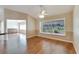 Spacious dining area with hardwood floors and a view at 334 Caloosa Palms Ct, Sun City Center, FL 33573