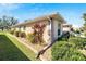 Well-maintained exterior with nicely landscaped yard at 334 Caloosa Palms Ct, Sun City Center, FL 33573