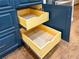 Well-organized kitchen cabinets with wooden drawers at 334 Caloosa Palms Ct, Sun City Center, FL 33573