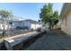 Fenced backyard with a garden area and detached garage at 3873 21St N Ave, St Petersburg, FL 33713