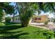 Spacious backyard with lush lawn and landscaping at 3873 21St N Ave, St Petersburg, FL 33713