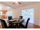 Dining room with a round table, four chairs, and access to the kitchen at 3873 21St N Ave, St Petersburg, FL 33713