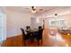 Dining area with four chairs and view into living room at 3873 21St N Ave, St Petersburg, FL 33713