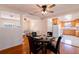 Open concept dining room with a glass-top table and kitchen views at 3873 21St N Ave, St Petersburg, FL 33713